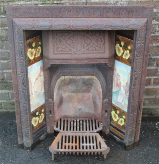 Victorian cast iron fireplace with tile panel inserts